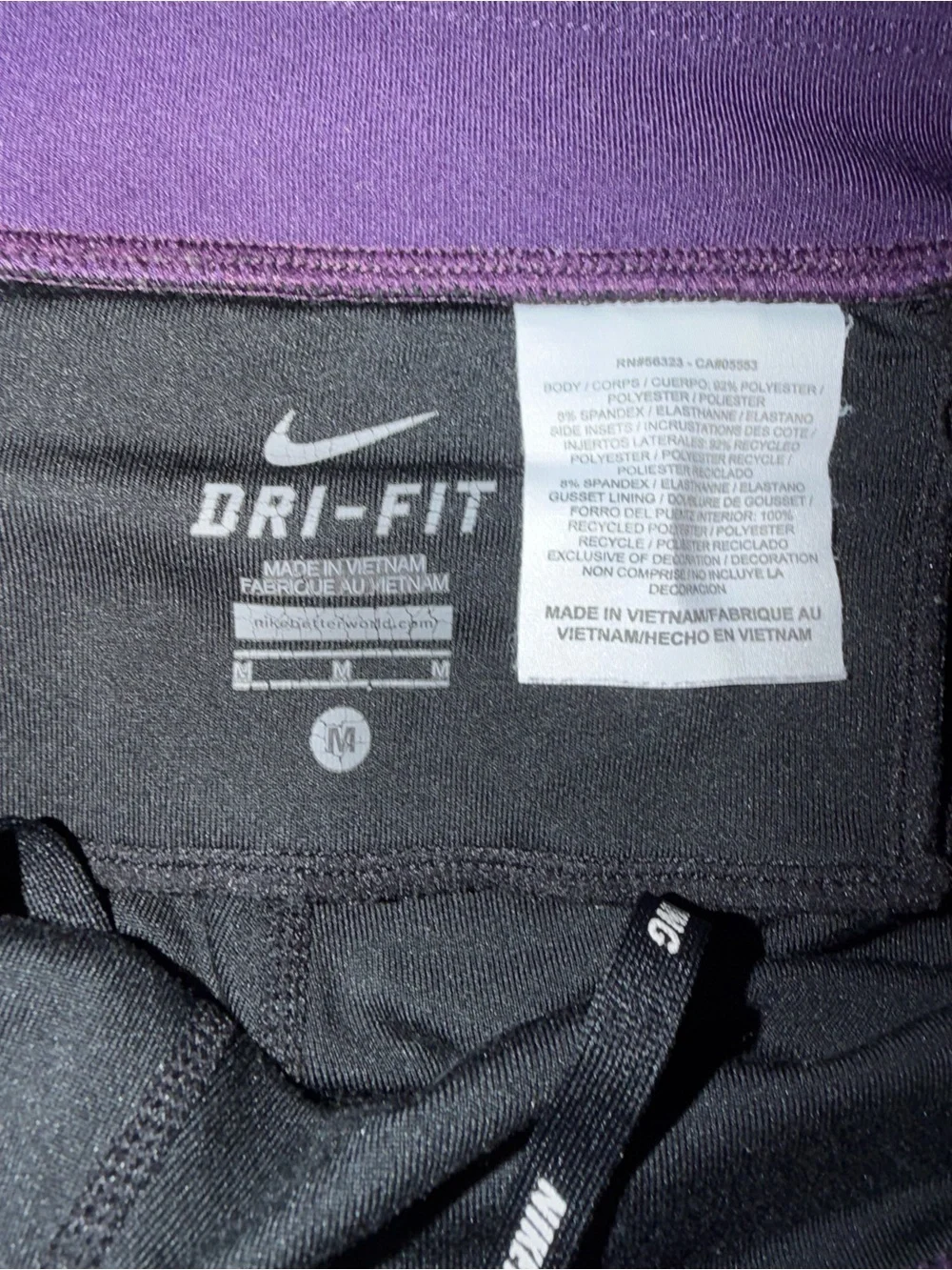 Nike Black capri Leggings with Purple Panels and Reflective Swoosh